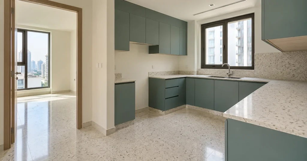 Pristine green kitchen cabinets and terrazzo flooring after move-in cleaning service